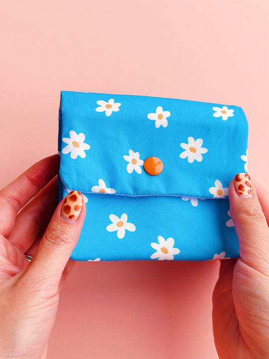 handmade blue daisy snap pouch with contrasting snap button