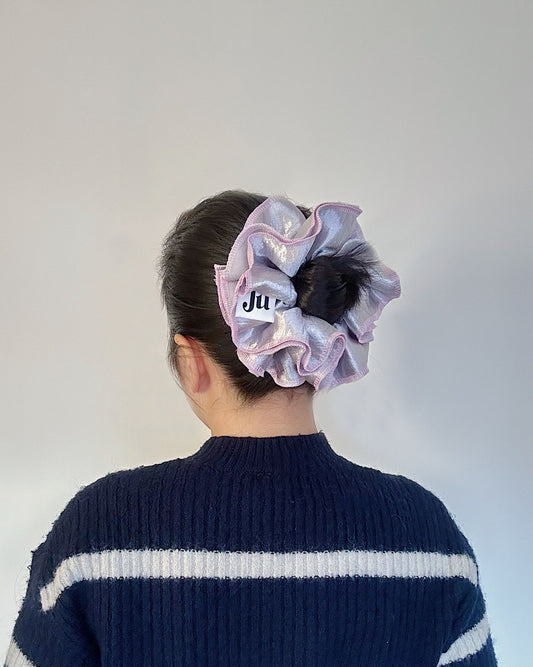 Oversized silver satin scrunchie with soft pink edges, shiny metallic hair accessory for Christmas party or festive hairstyles.