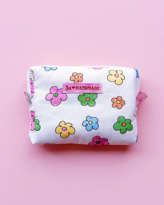a rectangle shape zipper pouch in colorful daisy print