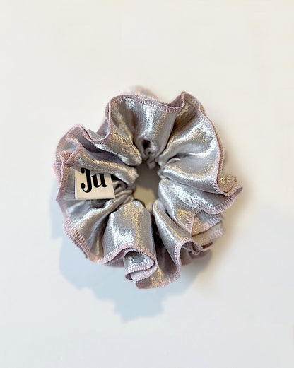 Oversized silver satin scrunchie with soft pink edges, shiny metallic hair accessory for Christmas party or festive hairstyles.