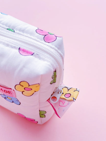 a cute colorful daisy zip up make up bag with YKK zipper