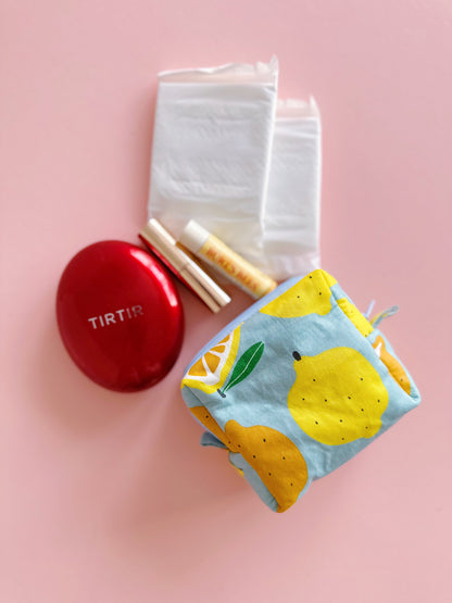 Cute citrus mini zipper pouch in pastel colors, soft quilted fruit print bag for everyday essentials.