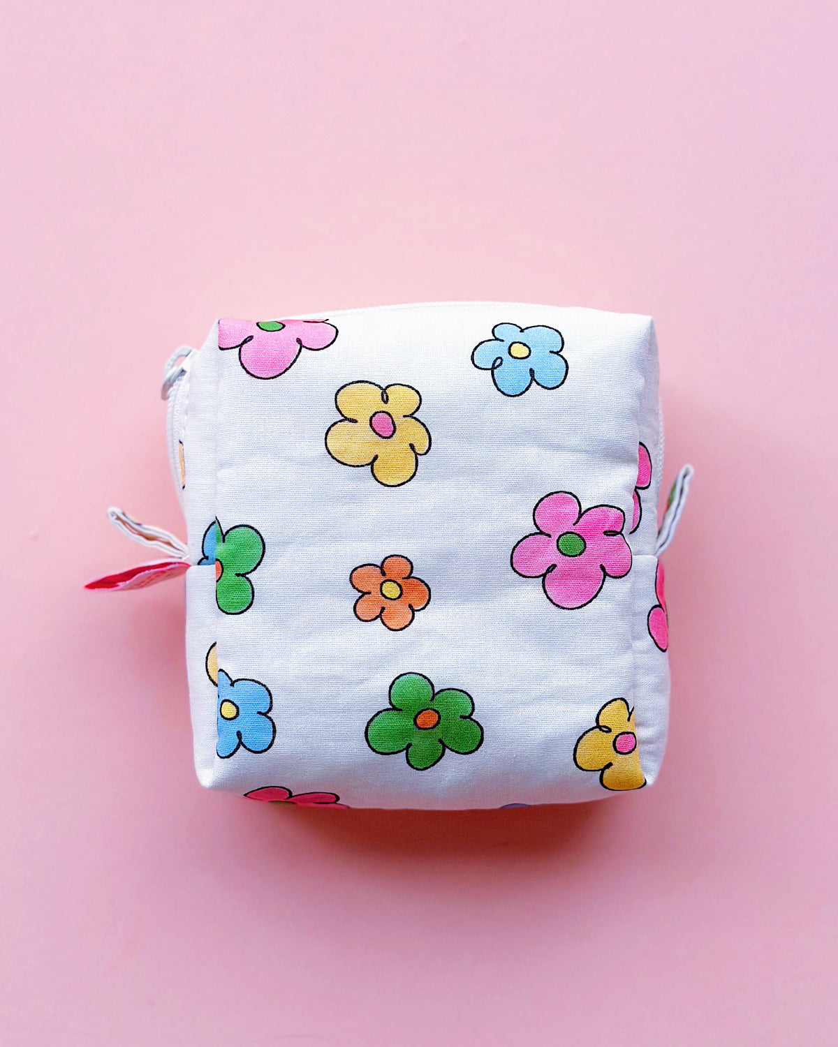 a cute colorful daisy zip up make up bag with YKK zipper