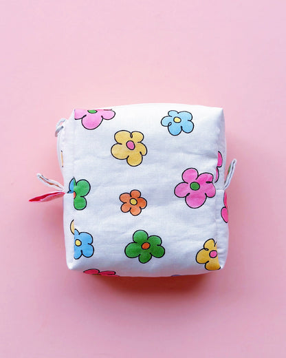a cute colorful daisy zip up make up bag with YKK zipper
