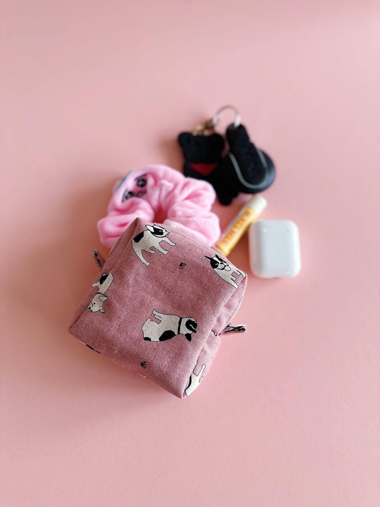 stylish coin purse, a secure holder for earbuds/AirPods, a keychain wallet, or a neat lipstick/mini cosmetic bag.